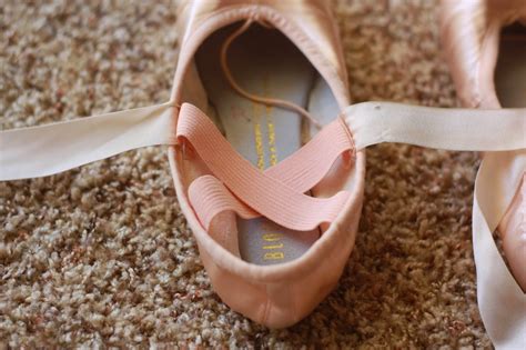 sewing ballet ribbons on shoes